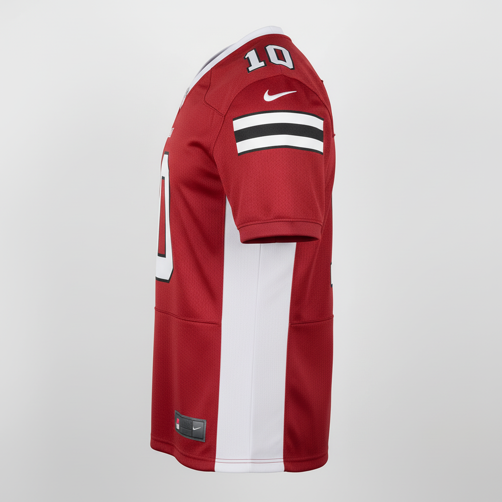 Side view of custom dazzle-mesh football jersey showing the dazzle body and mesh side panel