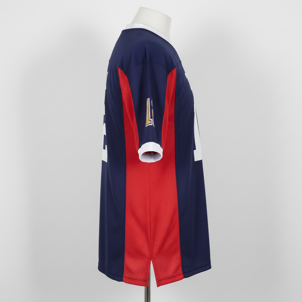 Side view of custom dazzle practice football jersey showing the dazzle body and mesh side panel