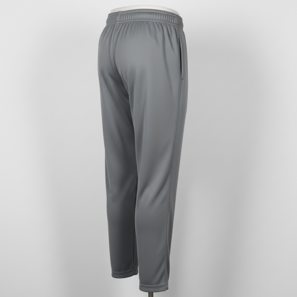 Back view of custom solid softball pants showing the belt-loop waistband and clean single-color leg