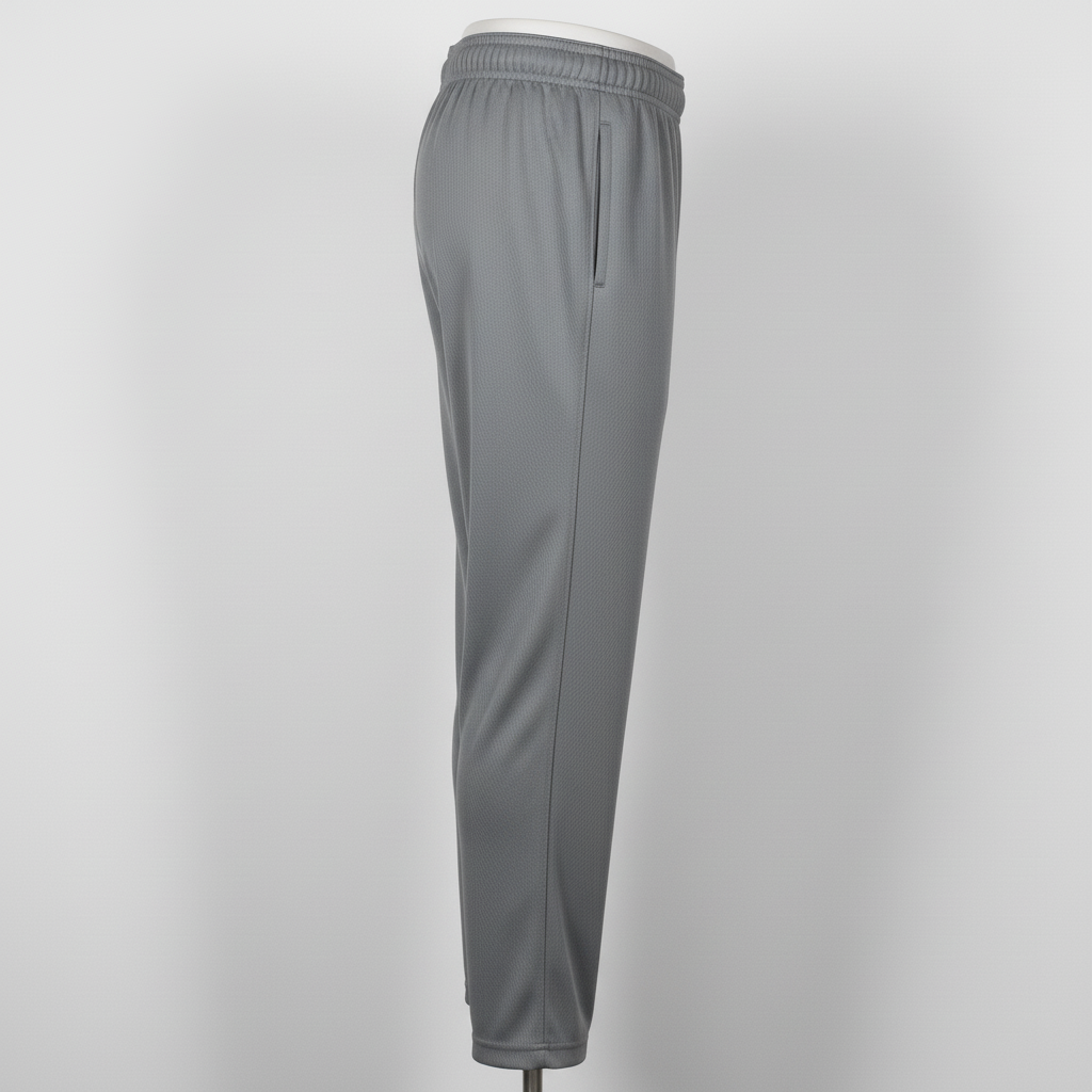Side view of custom solid softball pants showing the clean outer leg seam with no piping